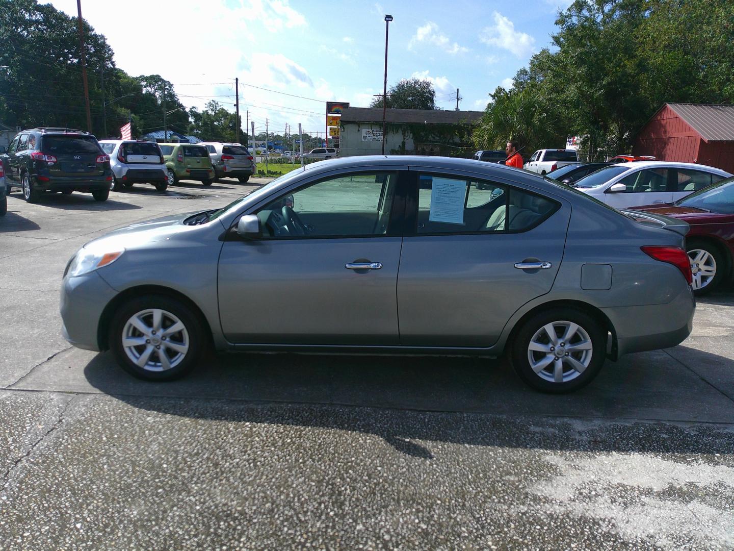 2014 GRAY NISSAN VERSA S; SL; SV (3N1CN7AP0EL) , located at 1200 Cassat Avenue, Jacksonville, FL, 32205, (904) 695-1885, 30.302404, -81.731033 - Photo#1